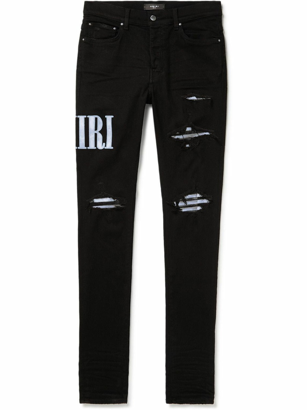 Photo: AMIRI - Skinny-Fit Logo-Appliquéd Panelled Distressed Jeans - Black