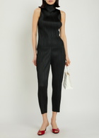 Pleats Please Issey Miyake Pleated Tapered-leg Woven Trousers Black