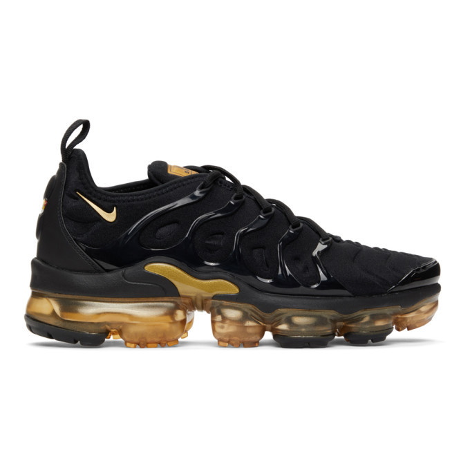 Photo: Nike Black and Gold Air Vapormax Plus Sneakers