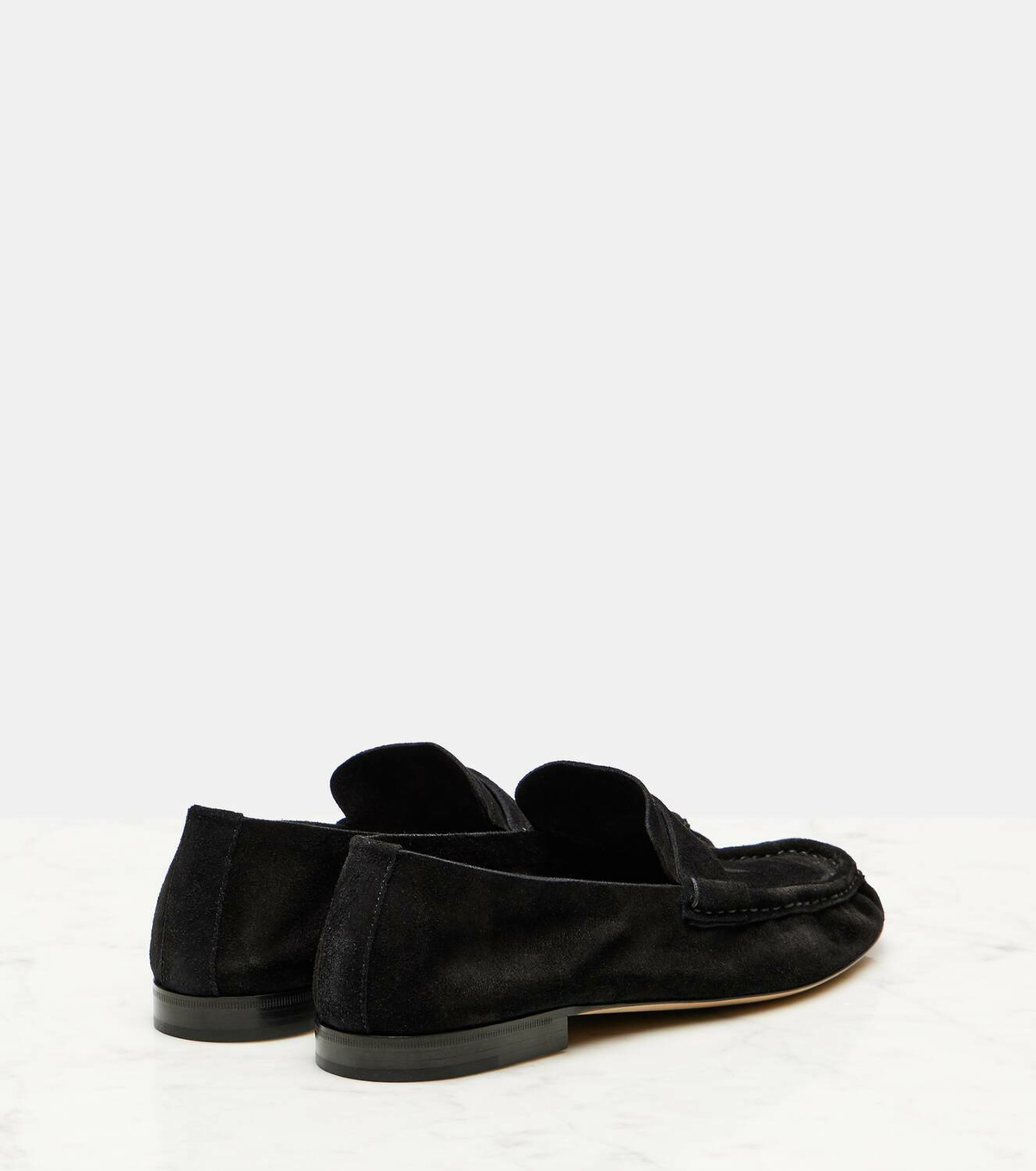 The Row Suede slip-on shoes