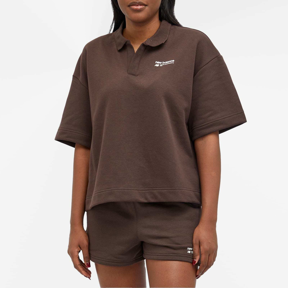 New Balance Women's Linear Heritage French Terry Collared Shirt in Black Coffee