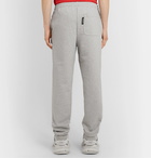 Vetements - Tapered Logo-Print Loopback Cotton-Jersey Sweatpants - Gray