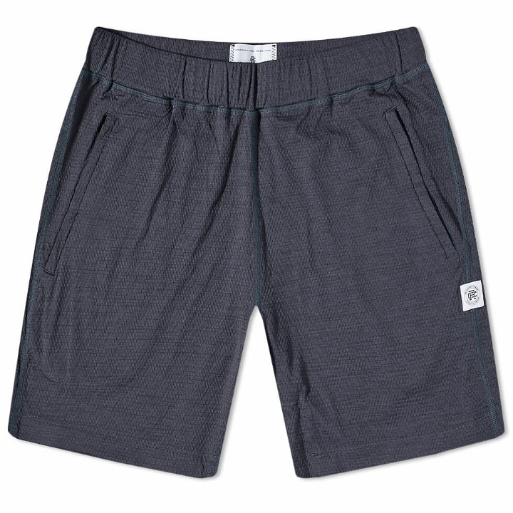 Photo: Reigning Champ Men's Solotex Mesh Trail Short in Midnight
