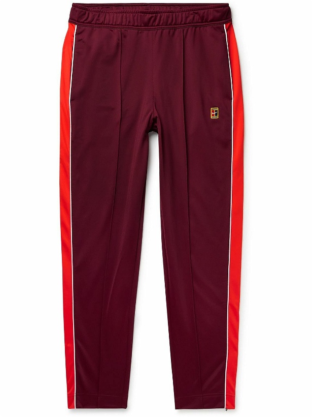 Photo: Nike Tennis - Tapered Panelled Tech-Jersey Tennis Sweatpants - Red