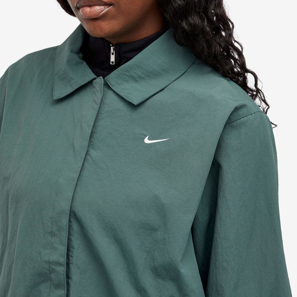 Nike Women's Essential Woven Coach Jacket in Green/White Nike