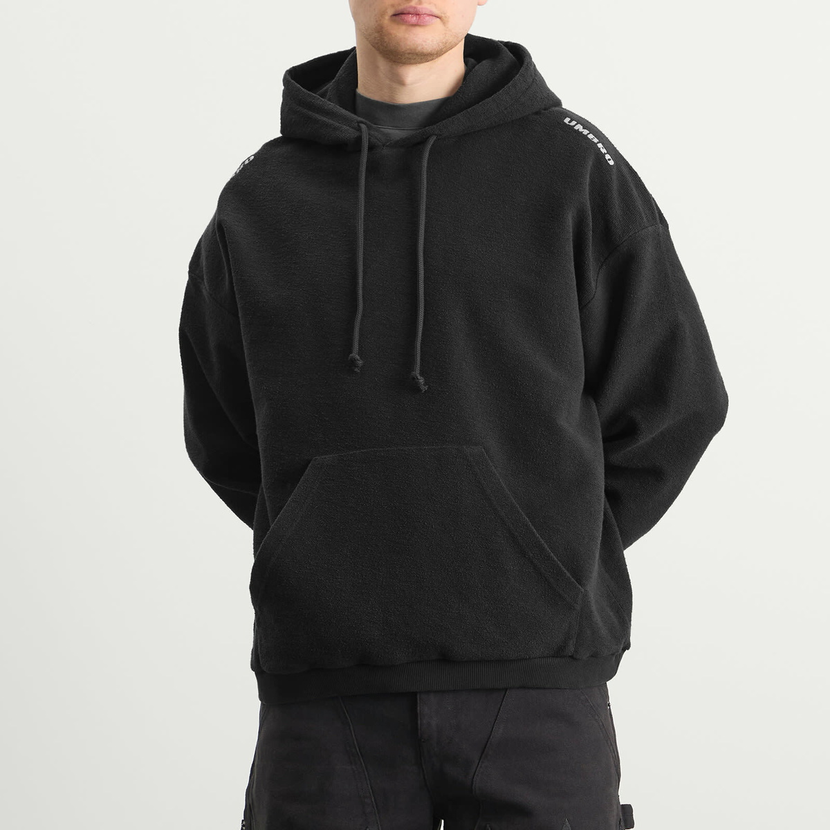 Umbro by Slam Jam Men's Lasered Masked Hoodie in Washed Black