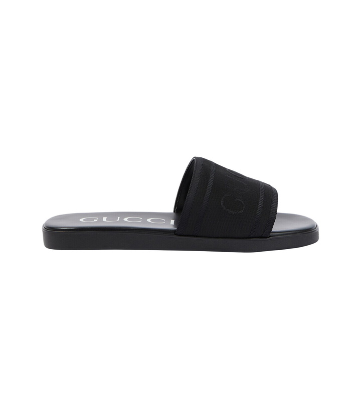 Photo: Gucci Logo canvas and leather slides