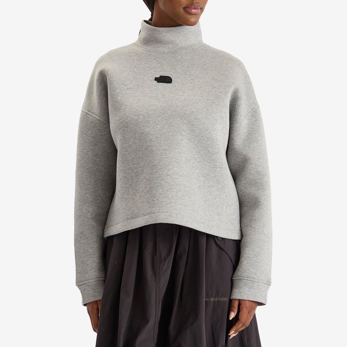 The North Face Women's Mock Neck Relaxed Sweatshirt in Metallic Silver Heather