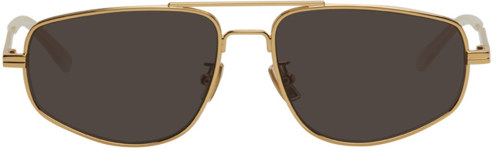 Photo: Bottega Veneta Gold Pilot Navigator Minimalist Sunglasses