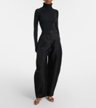 Alaïa Invisible leather wedge thong sandals