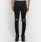 AMIRI - Thrasher Skinny-Fit Distressed Stretch-Denim Jeans - Men - Black