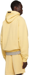 Fear of God ESSENTIALS Yellow Raglan Hoodie