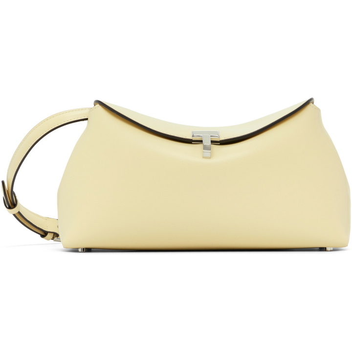 Photo: TOTEME Beige T-Lock Leather Clutch