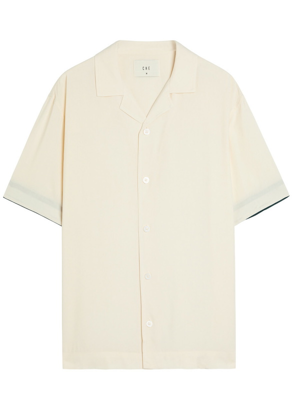 Photo: Che Valbonne Stripe-trimmed Shirt Ivory