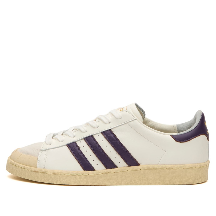 Photo: Adidas Men's Jabbar Lo Half Shell Sneaker in Off White/Violet/Warm Vanilla