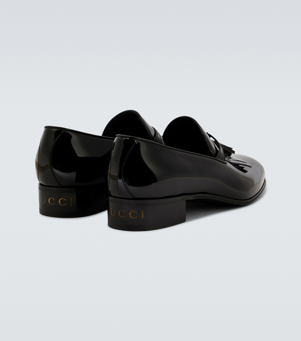 Gucci - Tasseled patent leather loafers