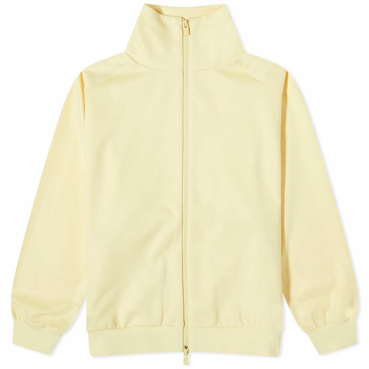 Photo: Adidas x FOG Women's Adidas x Fear of God Athletics Shiny Tricot Track Jacket in Pale Yellow