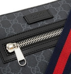 Gucci - Leather-Trimmed Monogrammed Coated-Canvas Messenger Bag - Black