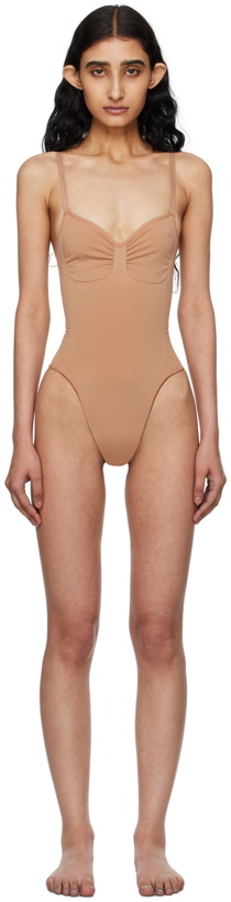 Photo: SKIMS Tan Seamless Sculpt Low Back Thong Bodysuit