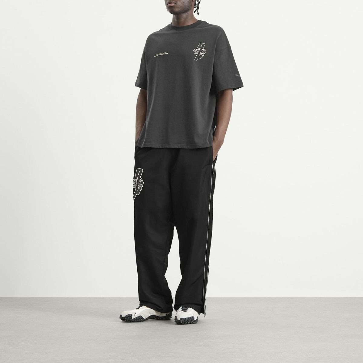 Puma Men's x Represent Graphic Pants in Puma Men's Black