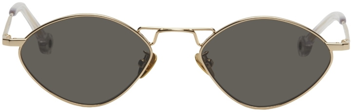 Photo: Études Gold Dream Oval Sunglasses