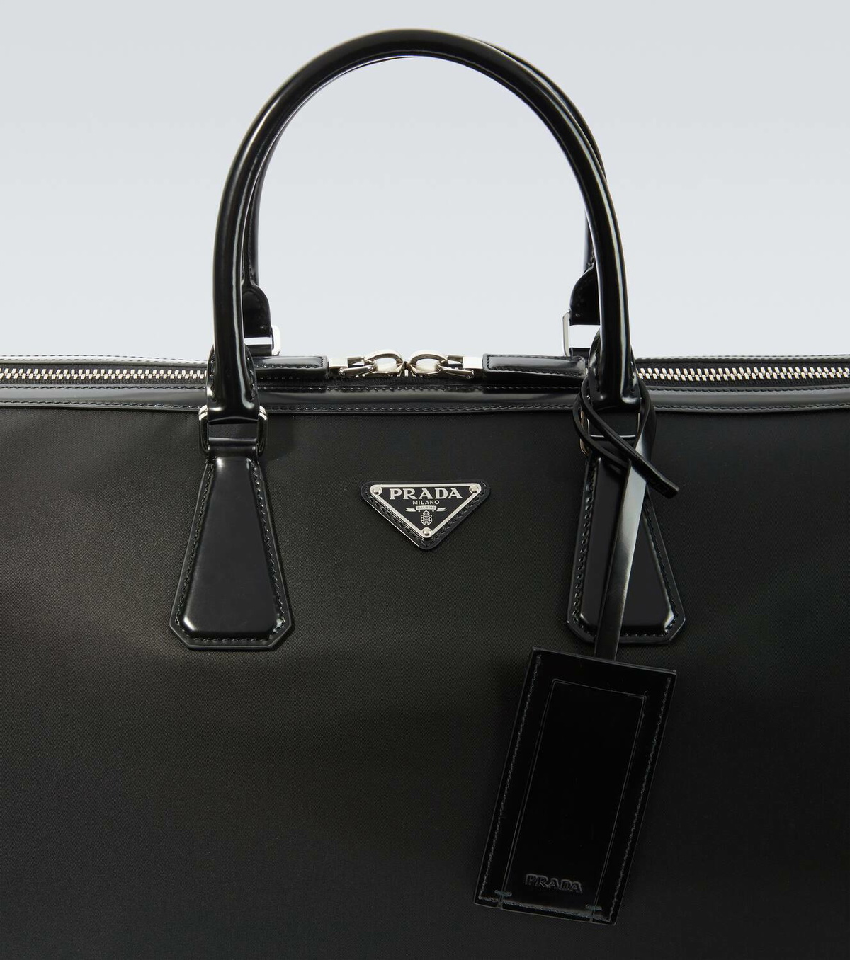 Prada Leather-trimmed duffel bag