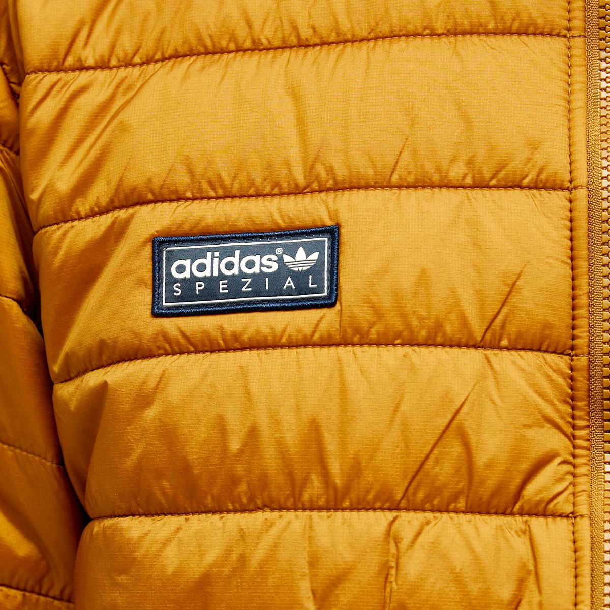 Adidas Statement Men's Adidas SPZL Topfield Liner in Bronze