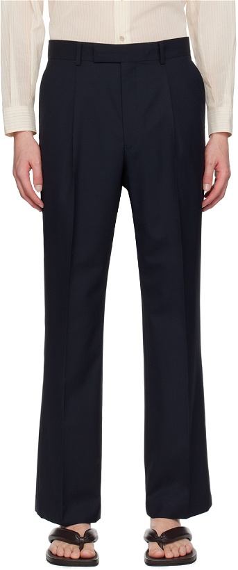 Photo: AURALEE Navy Pleated Trousers
