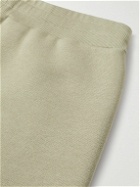AMI PARIS - Tapered Logo-Embossed Cotton-Blend Sweatpants - Green