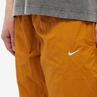 Nike Men's NRG Woven Track Pant in Desert Ochre/White