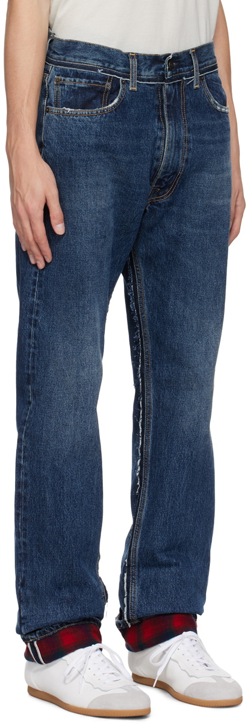 Indigo distressed hot sale jeans