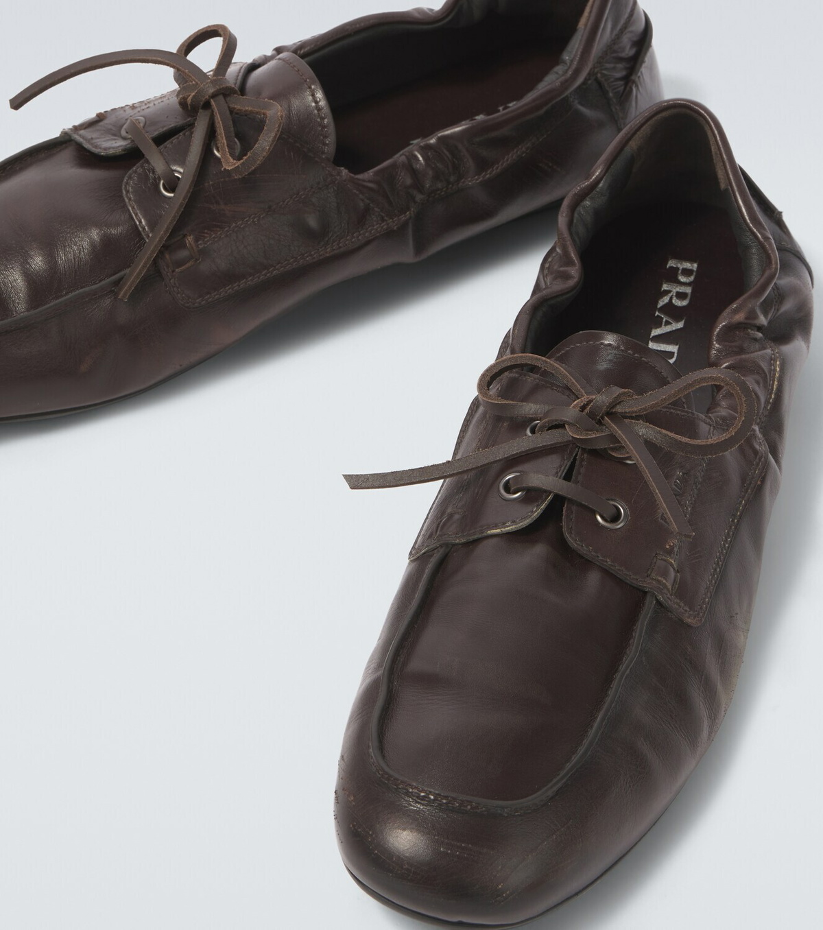 Prada Shuffle leather boat shoes