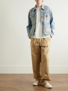 AMIRI - Logo-Appliquéd Distressed Denim Jacket - Blue