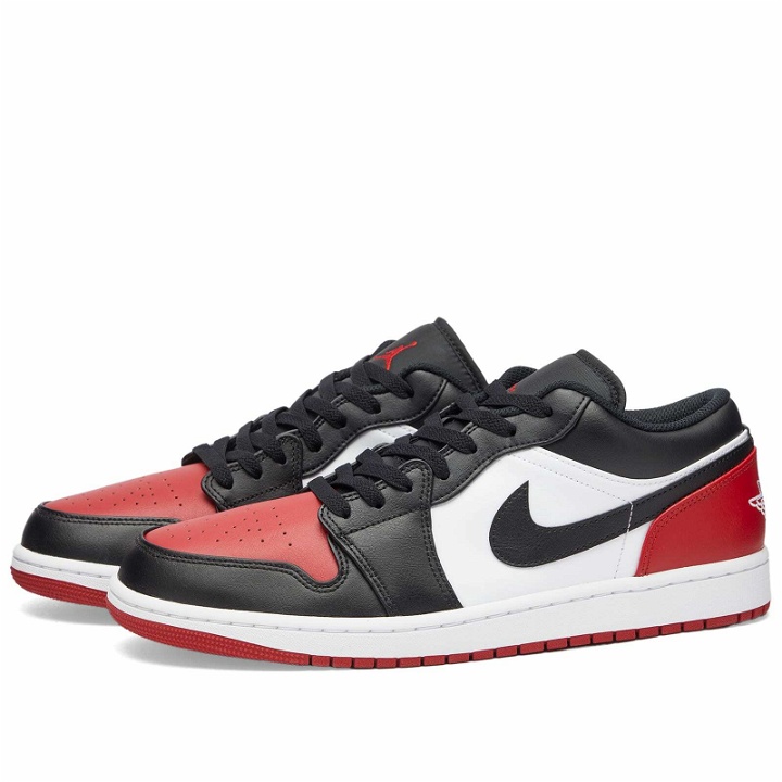 Photo: Air Jordan Men's 1 Low Sneakers in White/Black Varsity Red