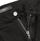 AMIRI - Track Skinny-Fit Striped Distressed Stretch-Denim Jeans - Men - Black