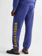 GUCCI - Tapered Printed Cotton-Jersey Sweatpants - Blue