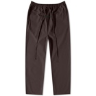 Fear of God ESSENTIALS Men's Woven Relaxed Trouser in Plum