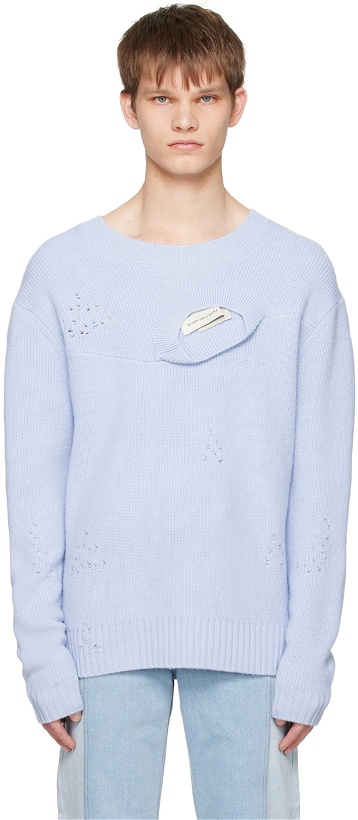 Photo: Feng Chen Wang Blue Distressed Sweater