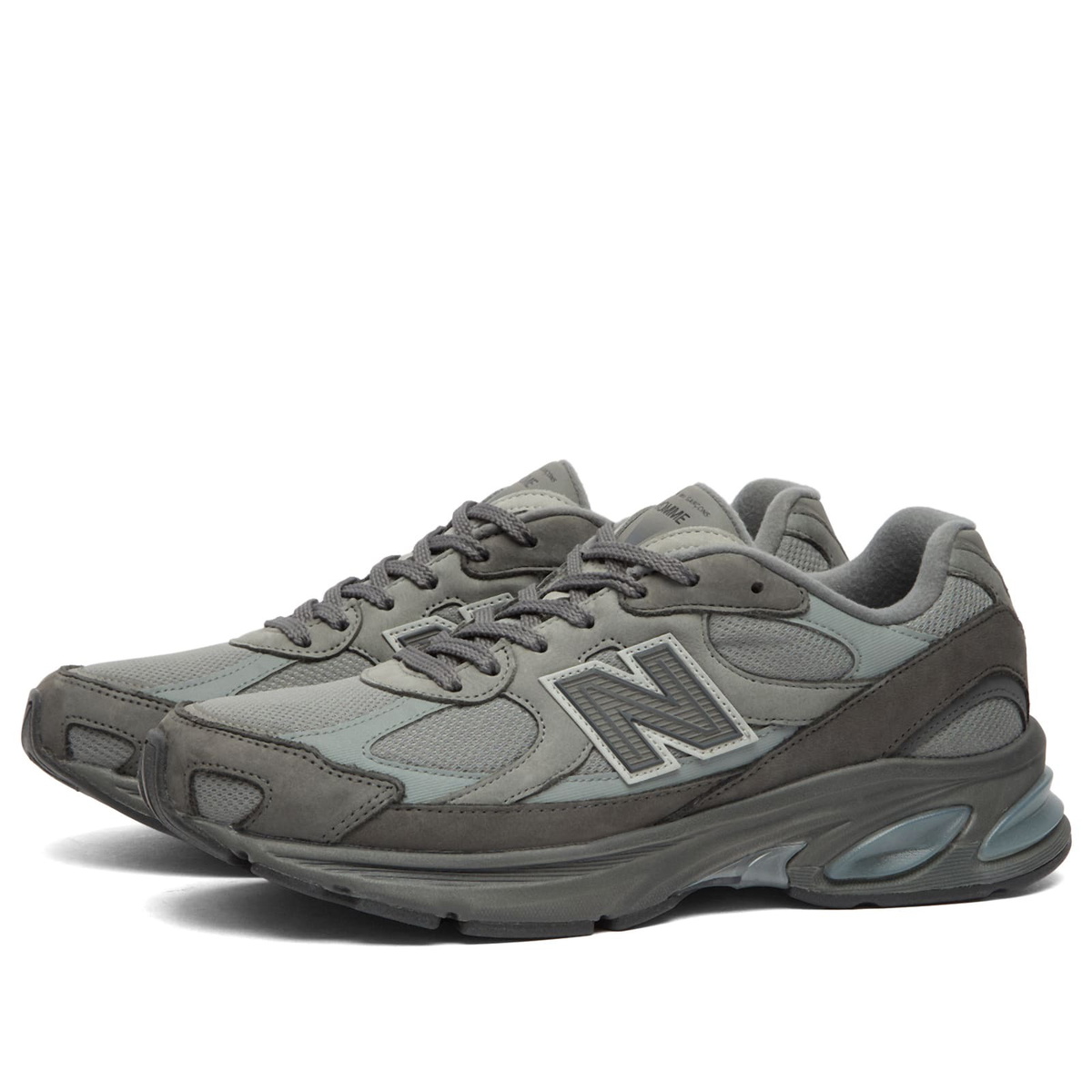 Comme des Garçons Homme Men's x New Balance 2010V Sneakers in Grey