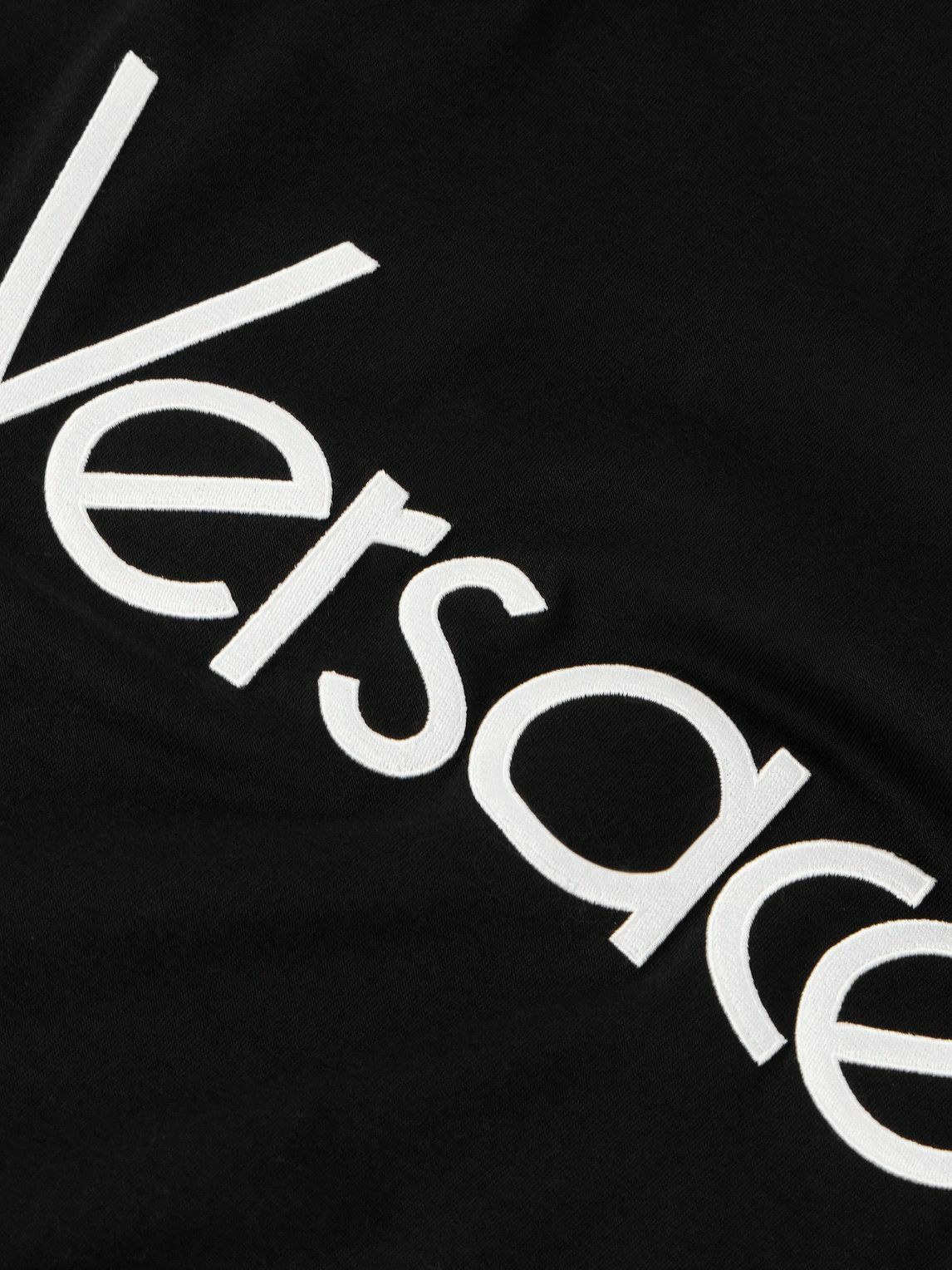 VERSACE ロゴ コットンTシャツ Versace logo-embellished Cotton T-shirt | Black | FARFETCH