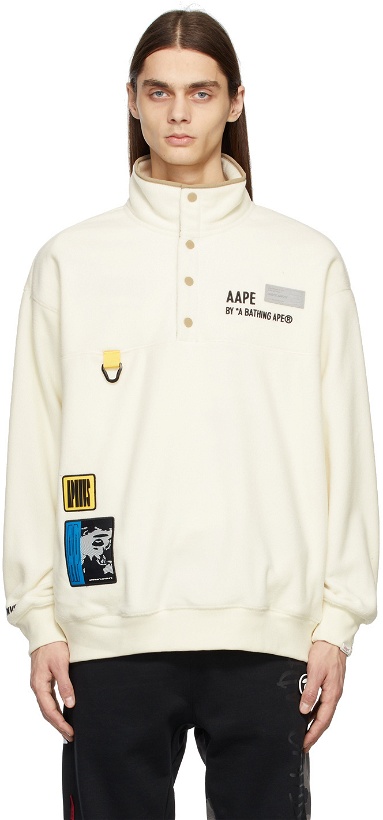 Photo: AAPE by A Bathing Ape Off-White Fleece Graphic Patch Sweatshirt