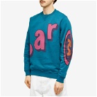 By Parra Men's Loudness Crew Sweat in Coral