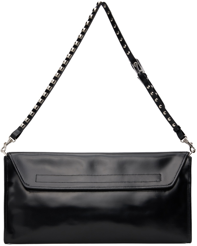 Photo: VAQUERA Black Oversized Clutch