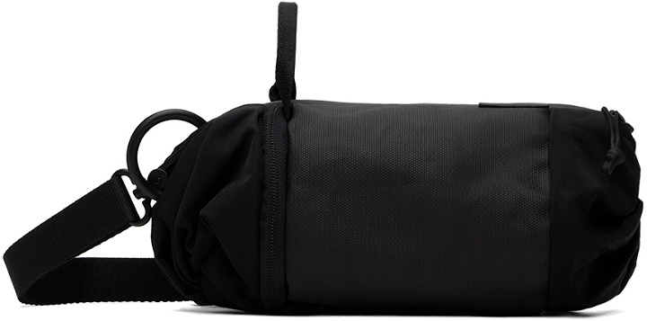 Photo: Côte&Ciel Black Mini Duffle Smooth Bag
