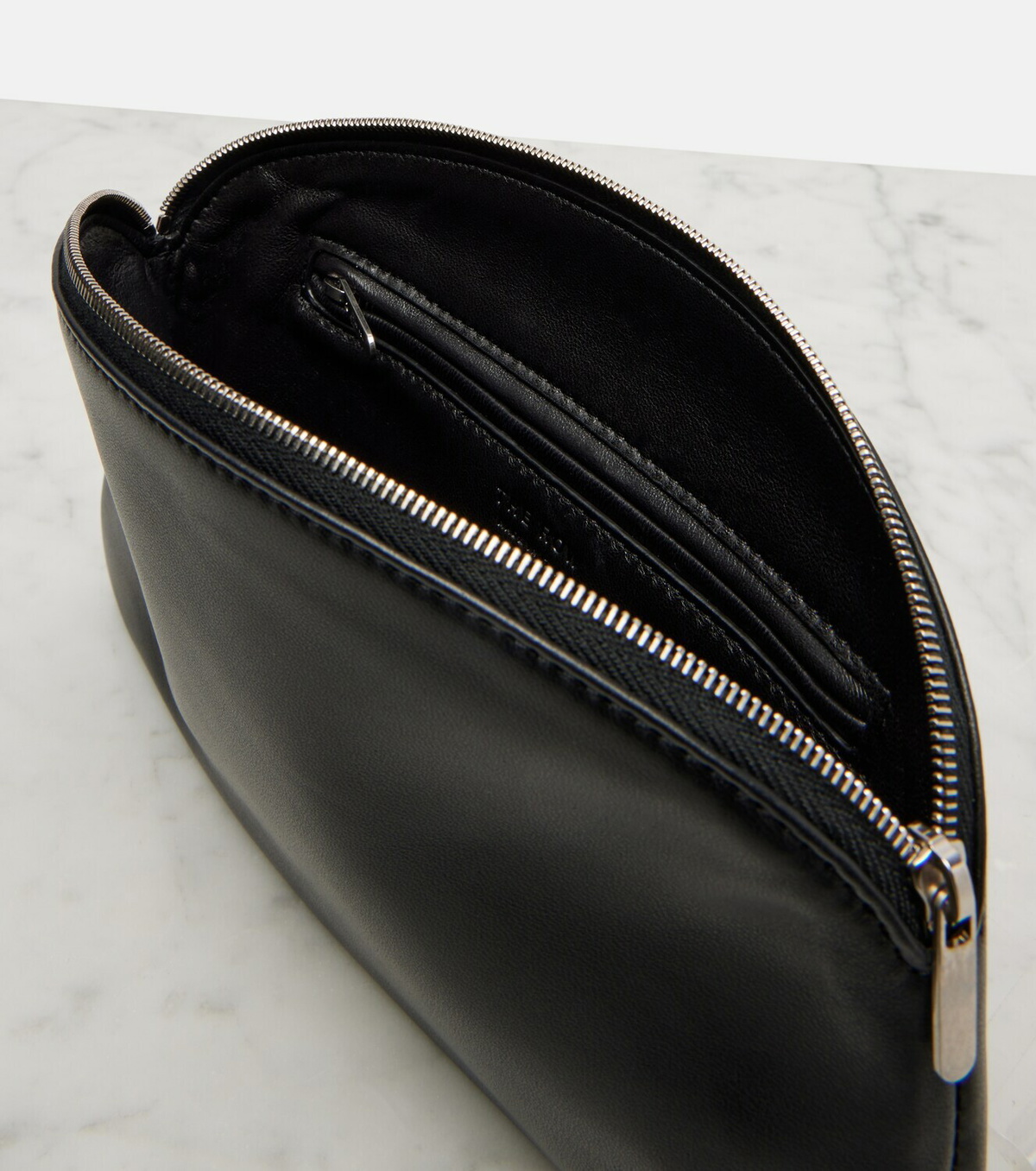 The Row Round leather coin purse