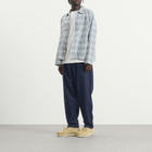 Universal Works Men's Wool Herringbone Pleated Track Pant in Navy