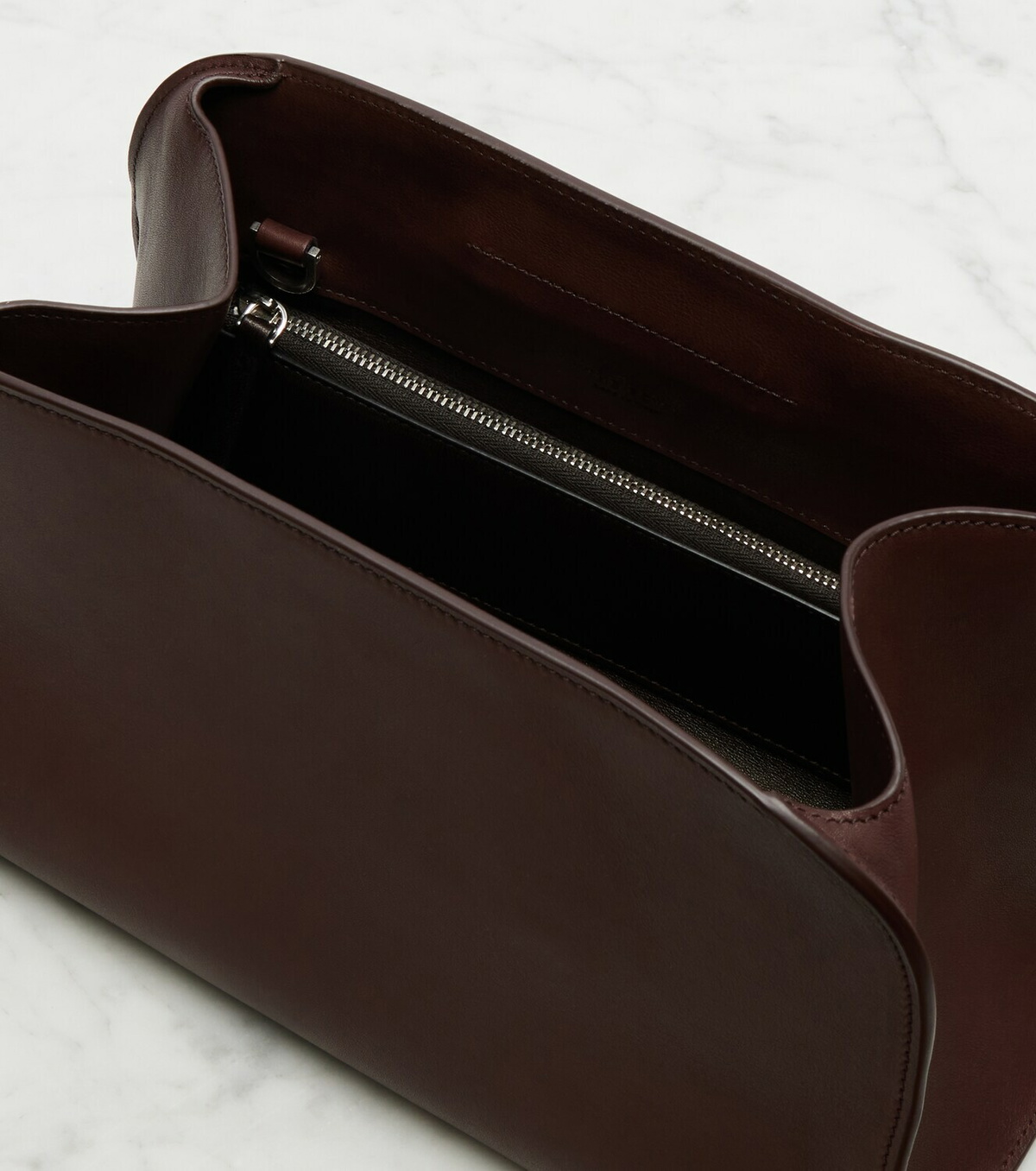 The Row Peggy Medium leather clutch