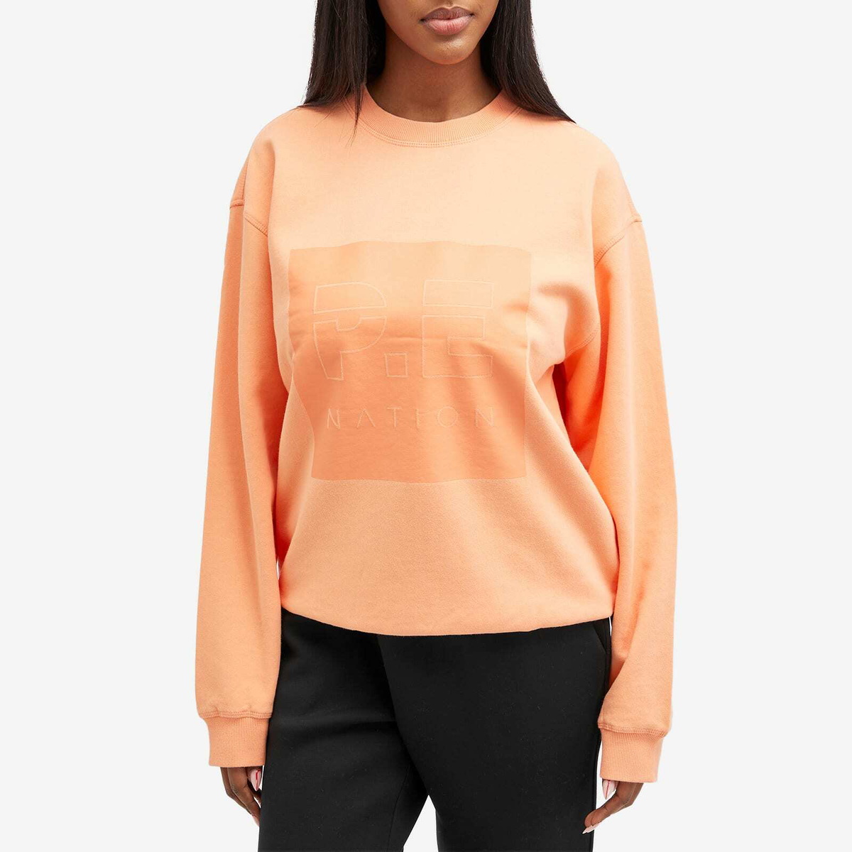 P.E Nation Women's Cut Shot Crew Sweat in Cantaloupe