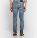 AMIRI - Skinny-Fit Panelled Distressed Stretch-Denim Jeans - Light denim