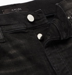 AMIRI - MX1 Skinny-Fit Panelled Distressed Stretch-Denim Jeans - Black